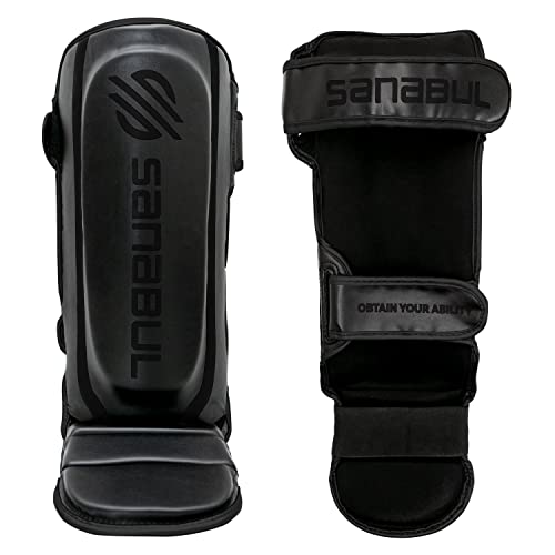 Sanabul Essential Kickboxing Shin Guards with Hook & Loop Straps | Pro-Tested & Versatile Shin Pads for MMA, Muay Thai, and Kickboxing - Tailored for Comfort and Mobility (Black, L/XL)