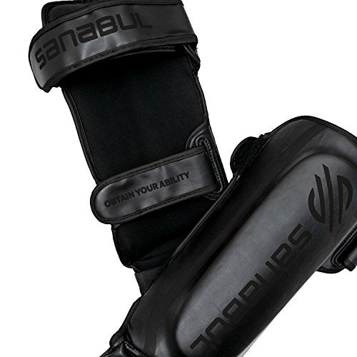 Sanabul Essential Kickboxing Shin Guards with Hook & Loop Straps | Pro-Tested & Versatile Shin Pads for MMA, Muay Thai, and Kickboxing - Tailored for Comfort and Mobility (Black, L/XL)